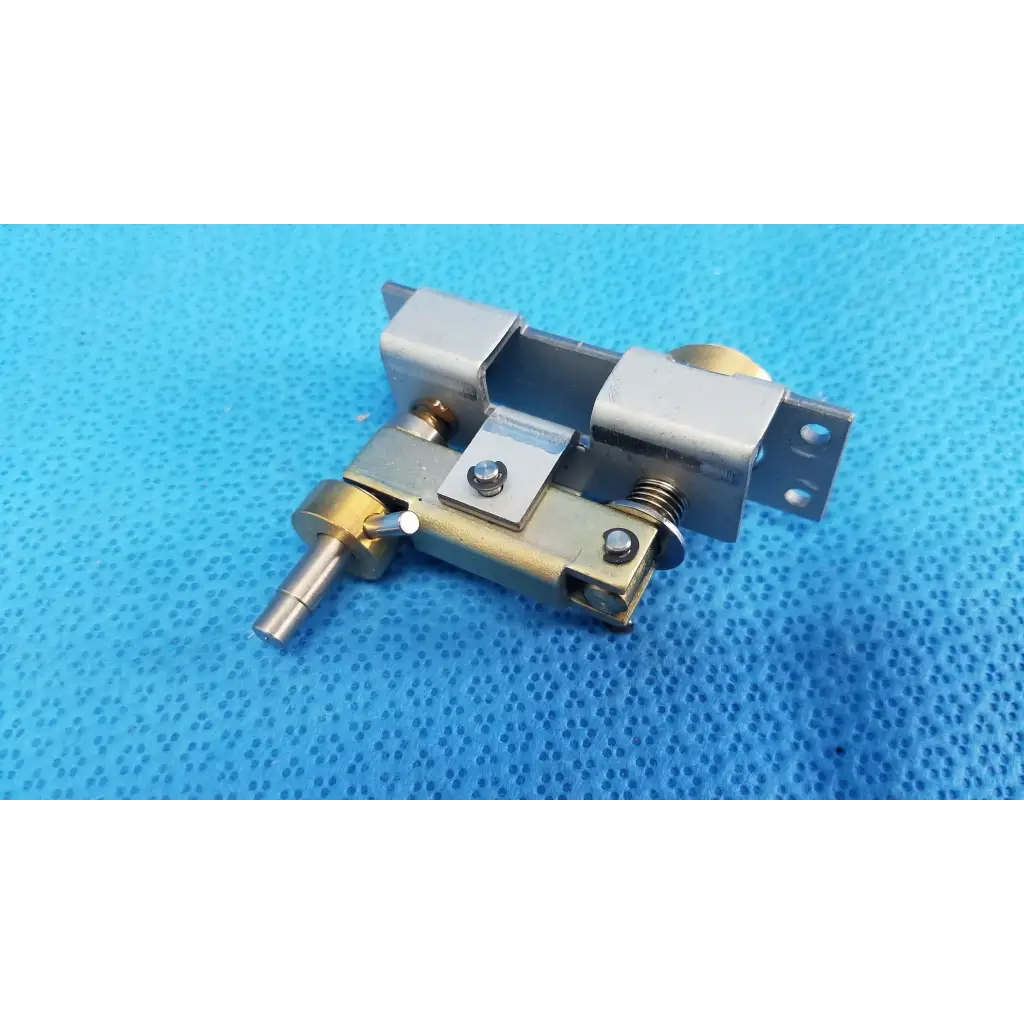 Silver and brass-colored metal main unit locking knob mechanical assembly with plunger pin and lever handle