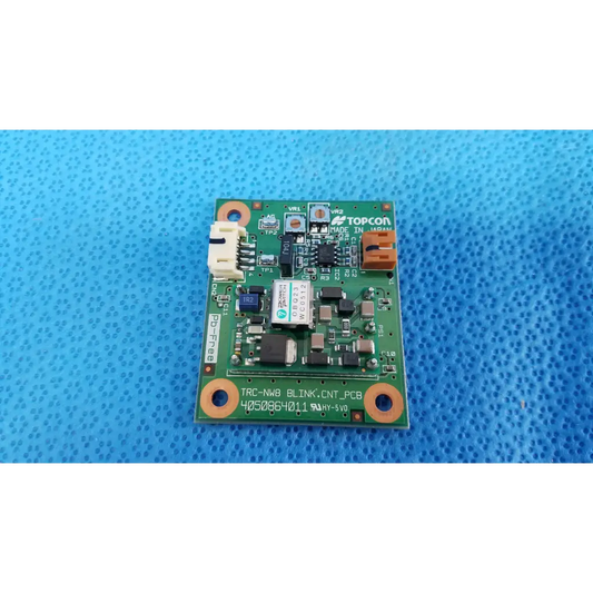 Green printed circuit board with orange mounting holes for internal blink control circuit board used in topcon trc-nw8