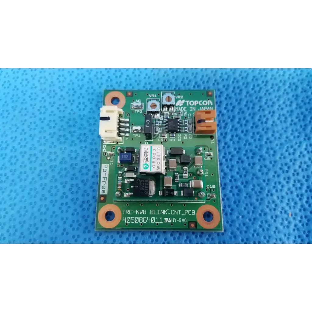 Green rectangular blink control circuit board labeled topcon trc-nwb blink control for retinal camera use