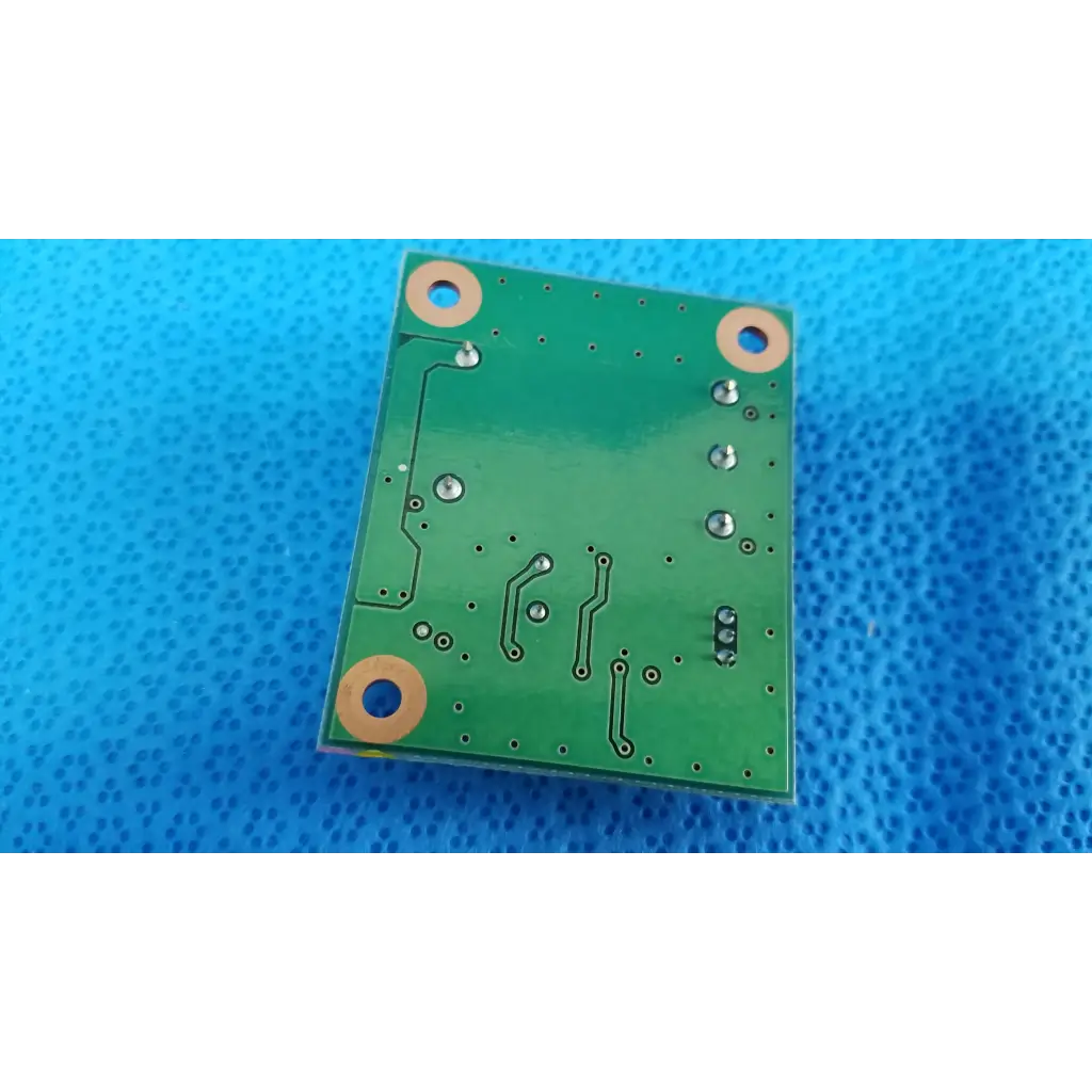 Green rectangular blink control circuit board with copper traces and mounting holes for topcon trc-nw8 fundus camera