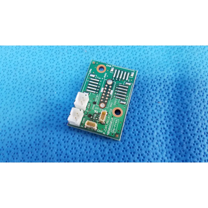 Green rectangular internal camera relay connection pcb board with white connectors and black components for topcon fundus camera