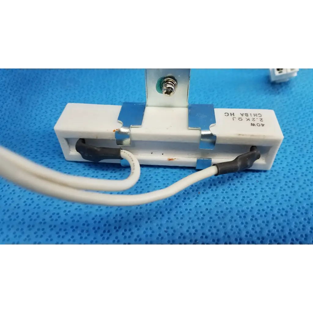 White ceramic power resistor with metallic terminals and black insulated wires for topcon fundus retinal camera