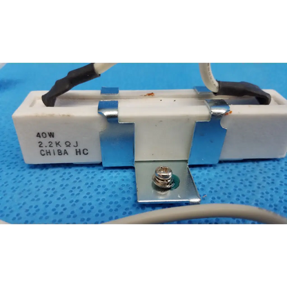 White ceramic power resistor with silver clamps and black wires labeled 40w 2.2k ohm for fundus retinal camera use
