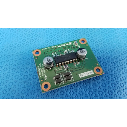 Green rectangular motor driver pcb with black integrated circuits and orange mounting holes for chinrest motor use