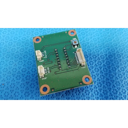 Green rectangular motor driver pcb board with orange mounting holes and white connectors for topcon chinrest motor