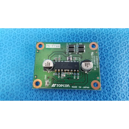 Green rectangular motor driver pcb board with black integrated circuits and capacitors for topcon chinrest motor