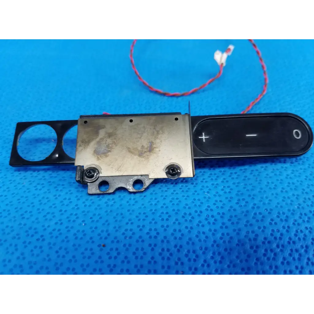 Black and silver electronic volume control module with plus minus and zero buttons for diopter slider lens use