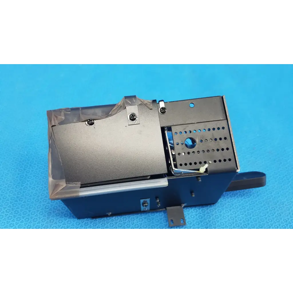 Black and silver industrial halogen illumination lamp assembly housing with perforated ventilation for Topcon TRC-NW6S fundus camera