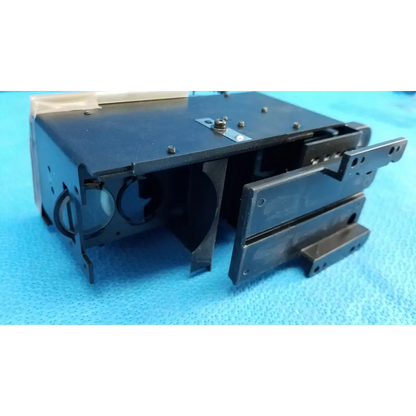 Black plastic halogen illumination lamp assembly with screws and cutouts for topcon trc-nw8 fundus camera