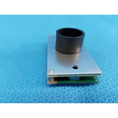 Silver rectangular internal image sensor board with black cylindrical lens mount and green circuit for topcon retinal camera