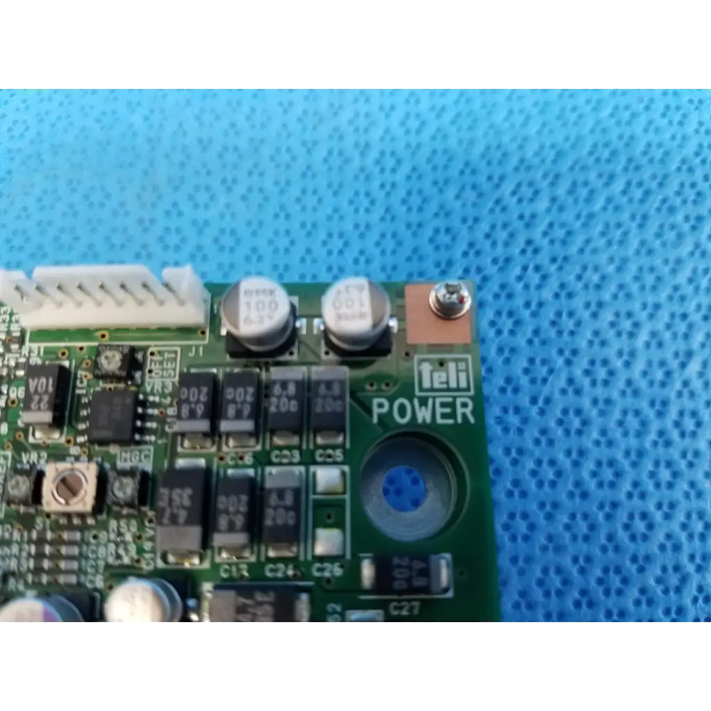 Green teli power circuit board with black and silver components for internal image sensor in topcon retinal camera
