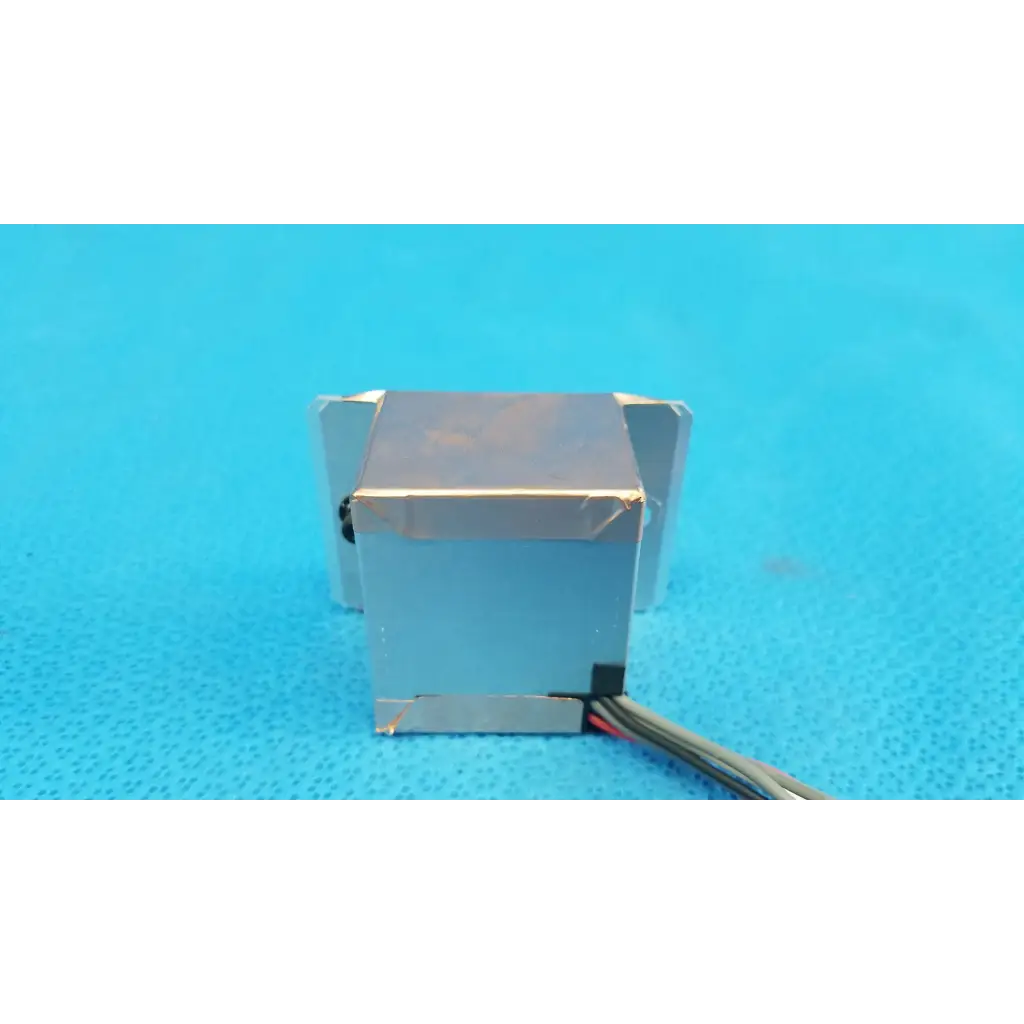 Silver-colored rectangular ccd sensor module with visible wiring for imaging alignment in topcon trc-nw6s retinal camera