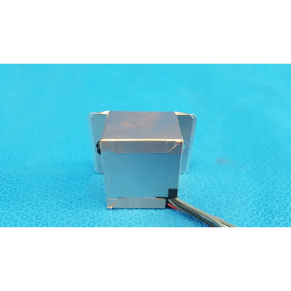 Silver-colored rectangular ccd sensor module with visible wiring for imaging alignment in topcon trc-nw6s retinal camera