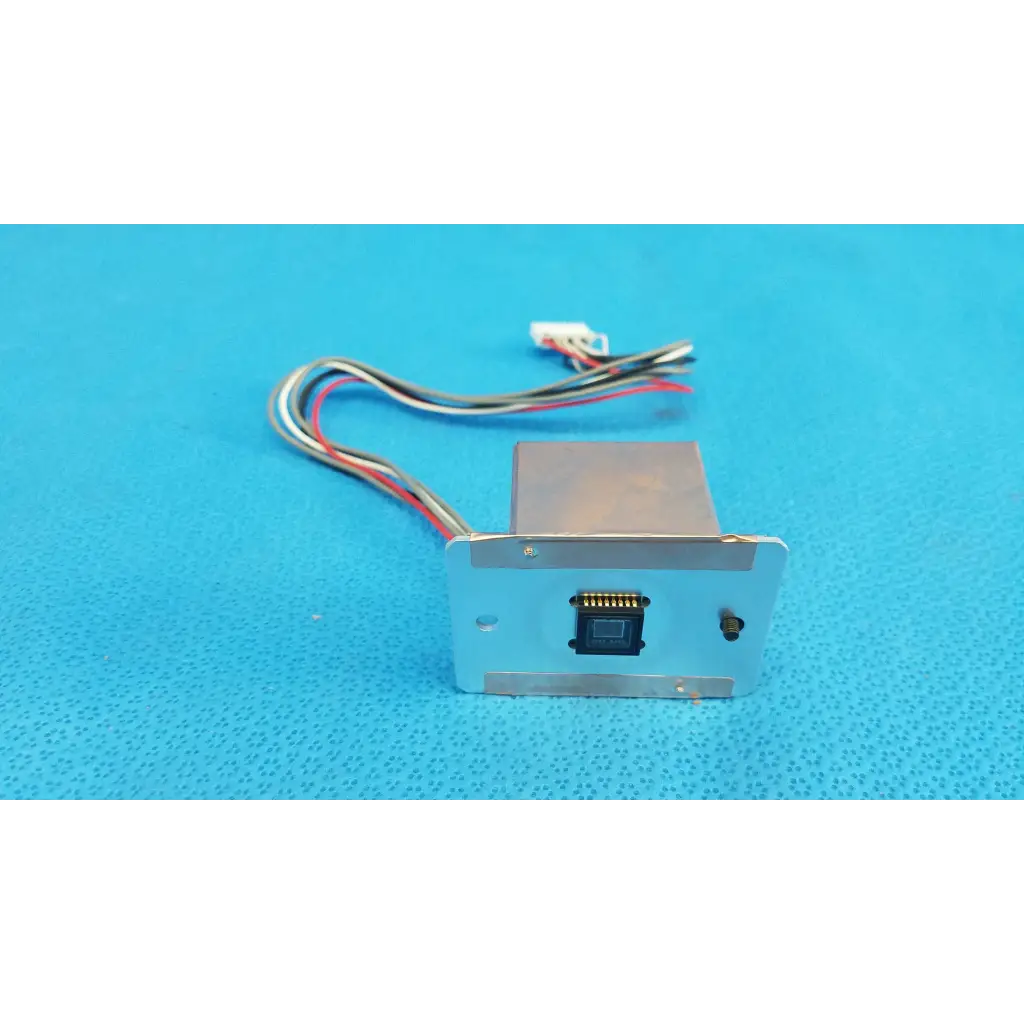 Silver rectangular ccd sensor module with multi-colored wiring for imaging alignment in topcon trc-nw6s retinal camera