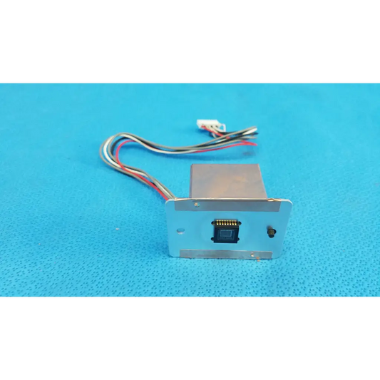 Silver rectangular ccd sensor module with multi-colored wiring for imaging alignment in topcon trc-nw6s retinal camera