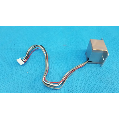 Metallic rectangular ccd sensor module with multi-colored wiring and white connector for imaging alignment in topcon retinal camera