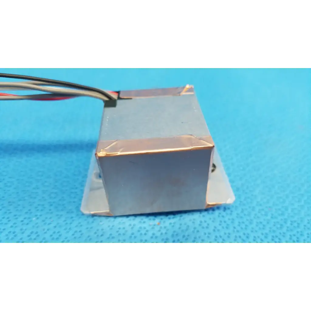 Rectangular ccd sensor module with copper-colored metal casing and attached wires for topcon trc-nw6s imaging alignment