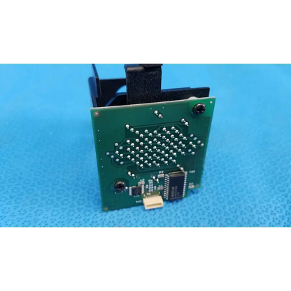 Green rectangular lcd dot matrix circuit board with silver solder points and black chips for fixation target use