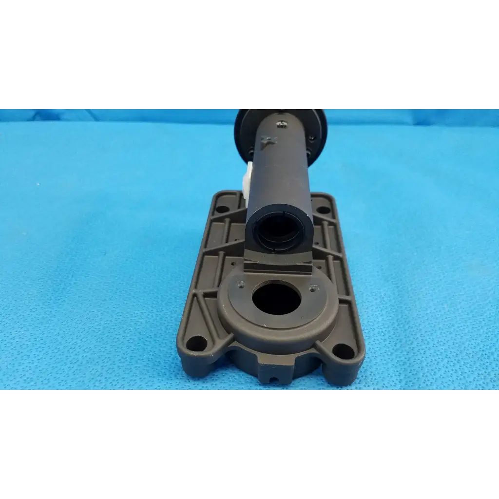 Dark gray plastic shock absorber with cylindrical body and bracket for internal main optical lens barrel focus drive block assembly
