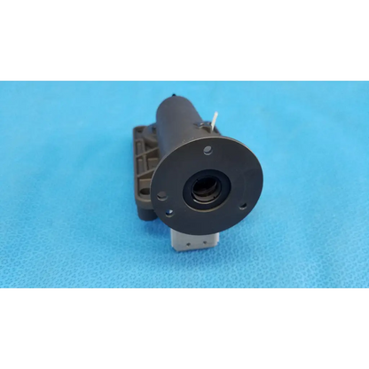 Black cylindrical internal lens barrel focus drive block assembly with porro prism and mounting holes for topcon trc-nw8