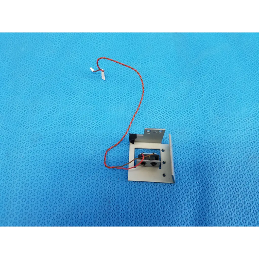 Metallic silver internal mechanical limit sensor with red and black wiring for Topcon TRC-NW8 fundus camera