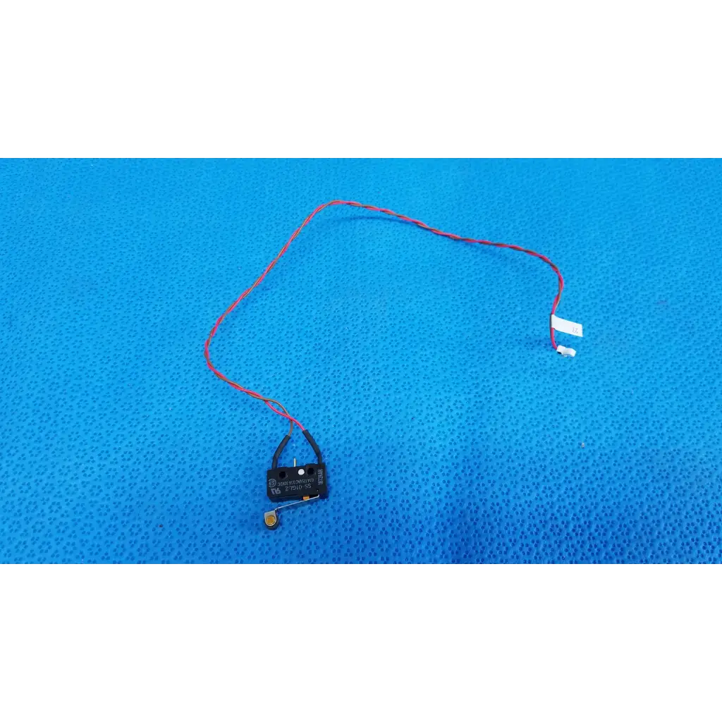 Black plastic internal mechanical hinge roller lever microswitch with red and black wires and white connector for topcon fundus camera
