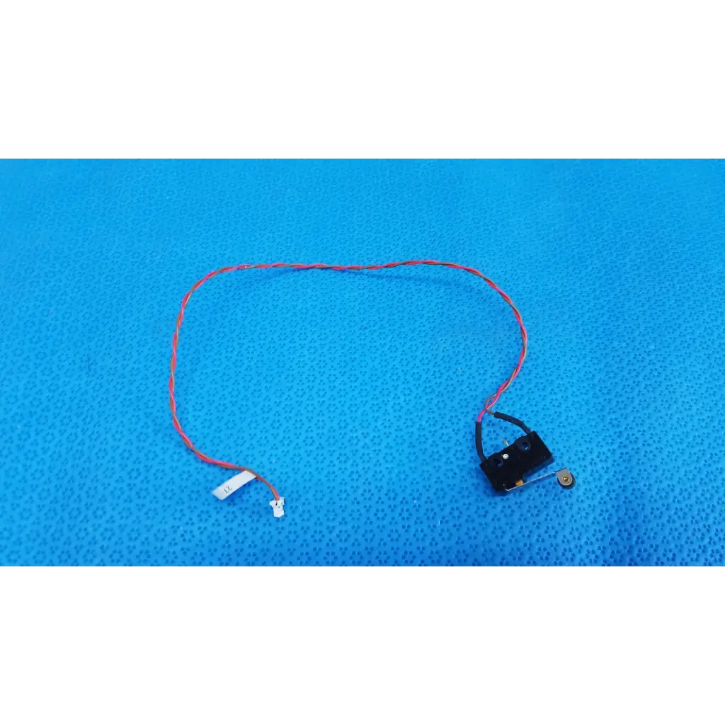Red and black twisted cable with small black connector for hinge roller lever microswitch in topcon retinal camera wire harness