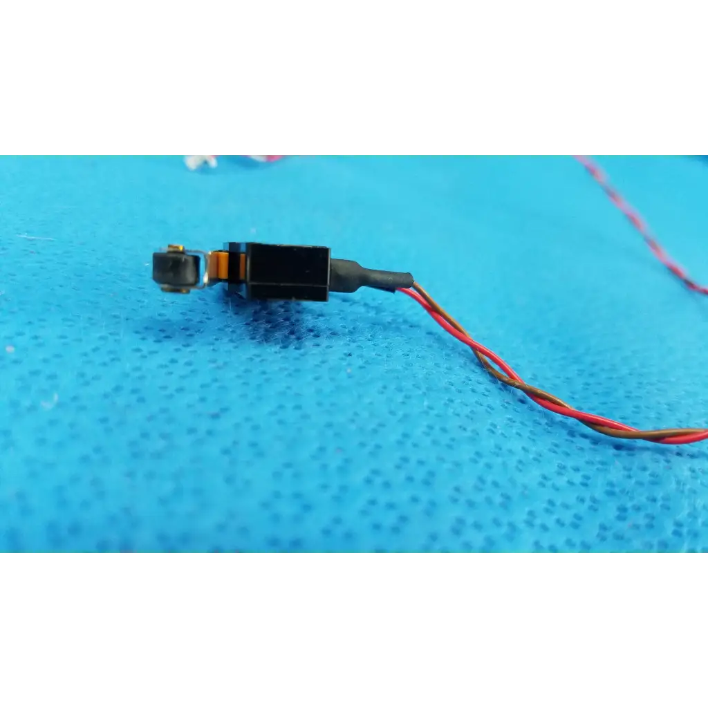 Black rectangular internal mechanical subminiature hinge roller lever microswitch with red and brown wires for topcon fundus camera