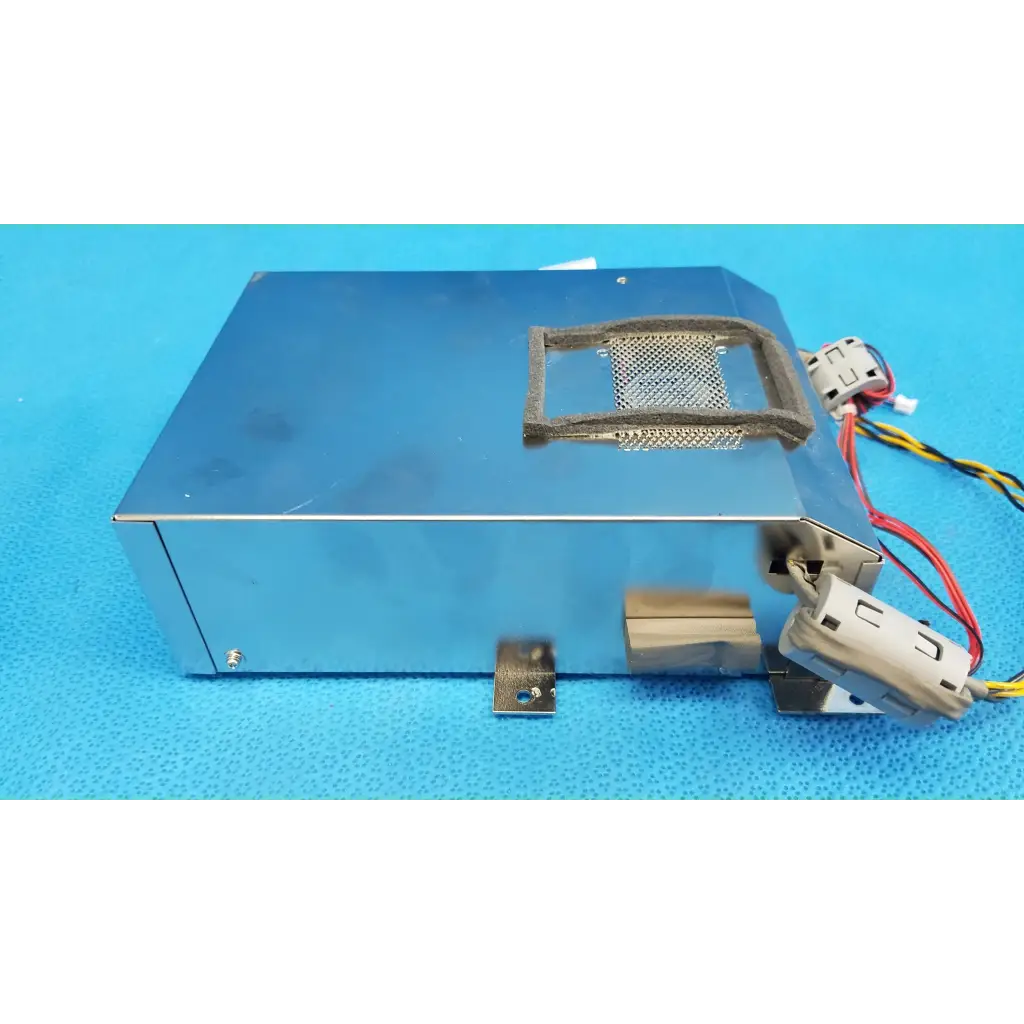 Silver metallic rectangular power supply unit with mesh vent and wiring connectors for motherboard cpu core computer assembly