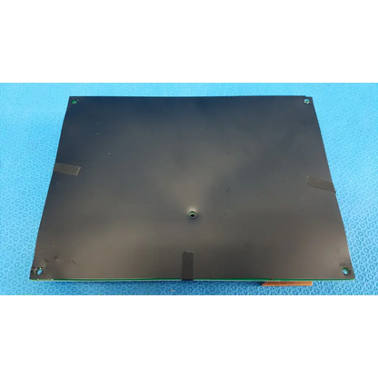 Black rectangular internal nichicon yddt2811 power supply board with mounting and central holes for topcon fundus camera