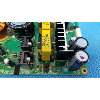 Green power supply board with black and yellow capacitors and transformer for topcon fundus camera model trc-nw8