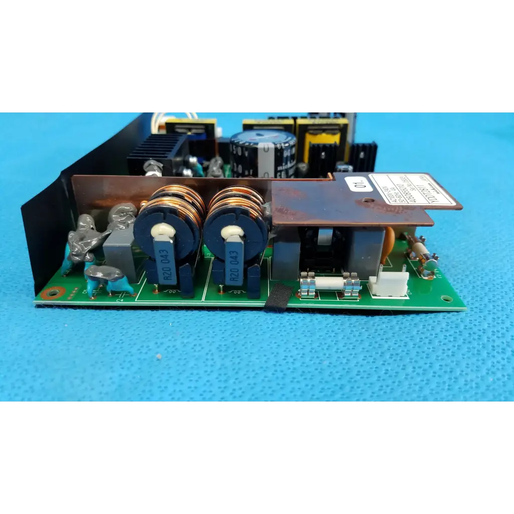 Internal nichicon yddt2811 green power supply board with black and blue capacitors and copper windings for topcon fundus camera