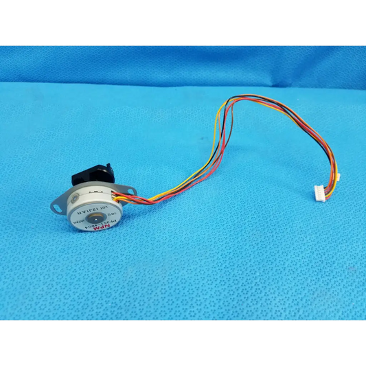 White cylindrical npm rotary encoder with multicolored wiring and black bracket for trc-nw8 retinal camera stepper motor