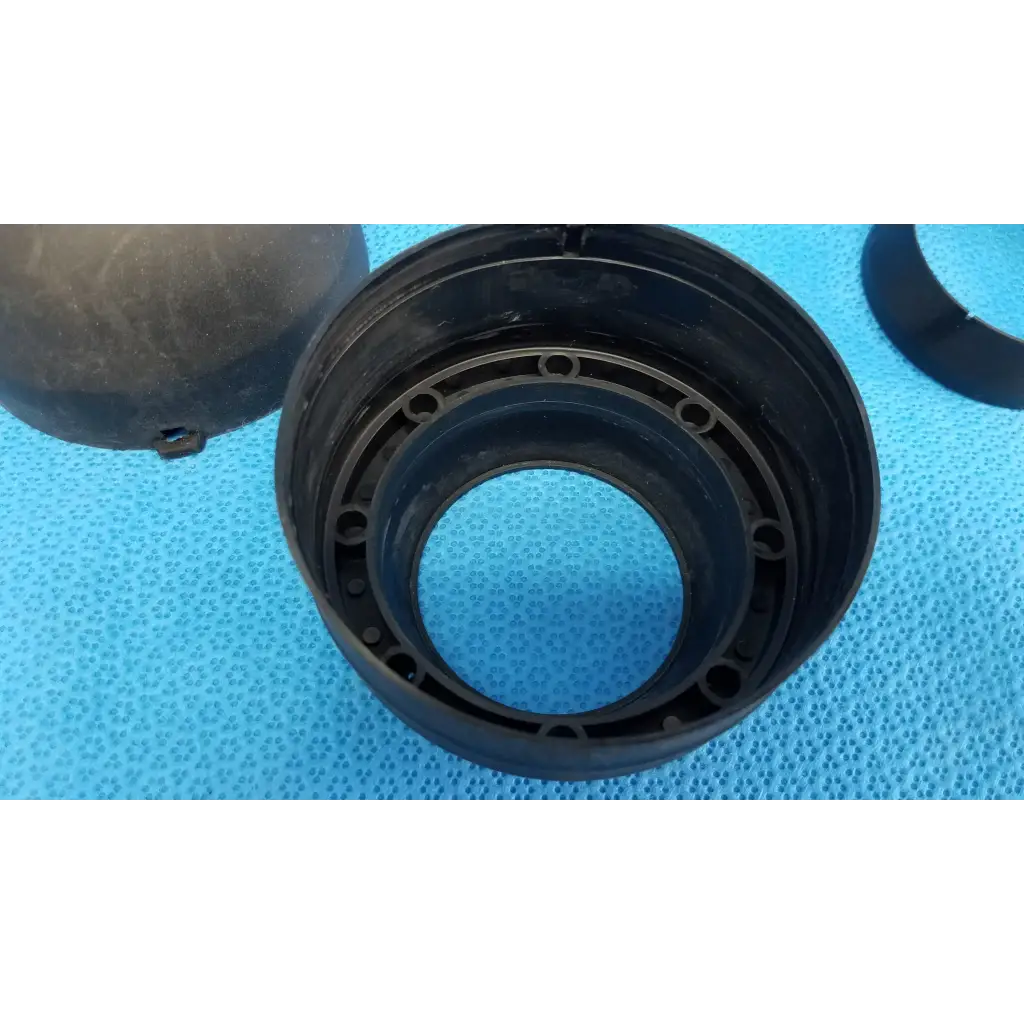 Black plastic internal objective lens alignment ring with holes for dust cap and viewfinder bellows in topcon trc-nw8 set