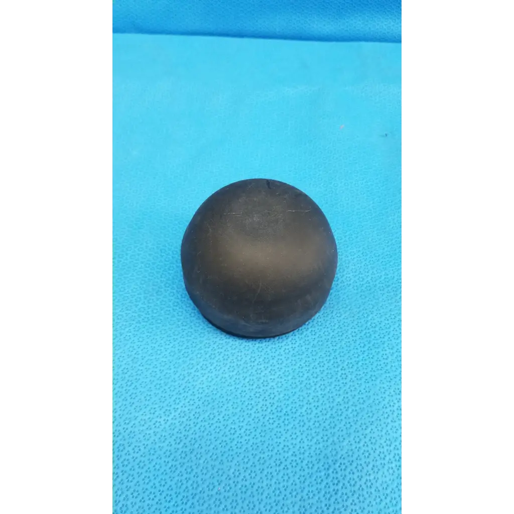 Matte black spherical dust cap with slight wear and subtle sheen for topcon trc-nw8 viewfinder bellows alignment ring set