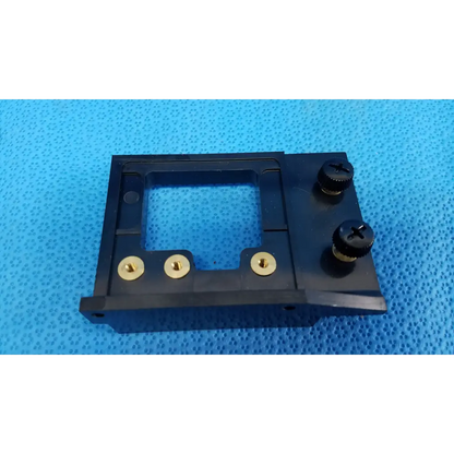 Black plastic internal optical alignment mirror mount slider bracket with four brass screws for topcon fundus camera
