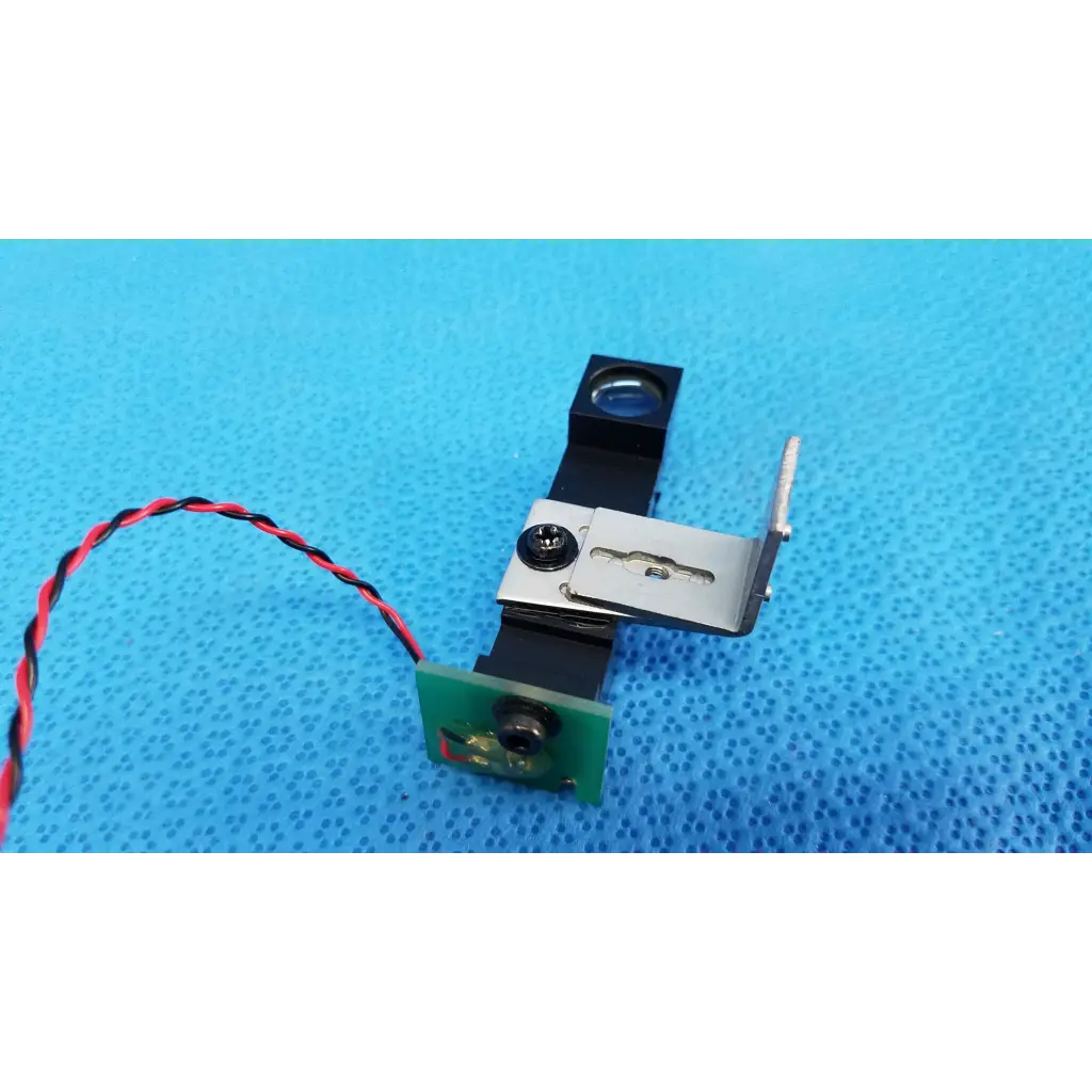 Black and silver internal optical alignment prism lens module with green circuit board and wiring for Topcon TRC-NW8 camera