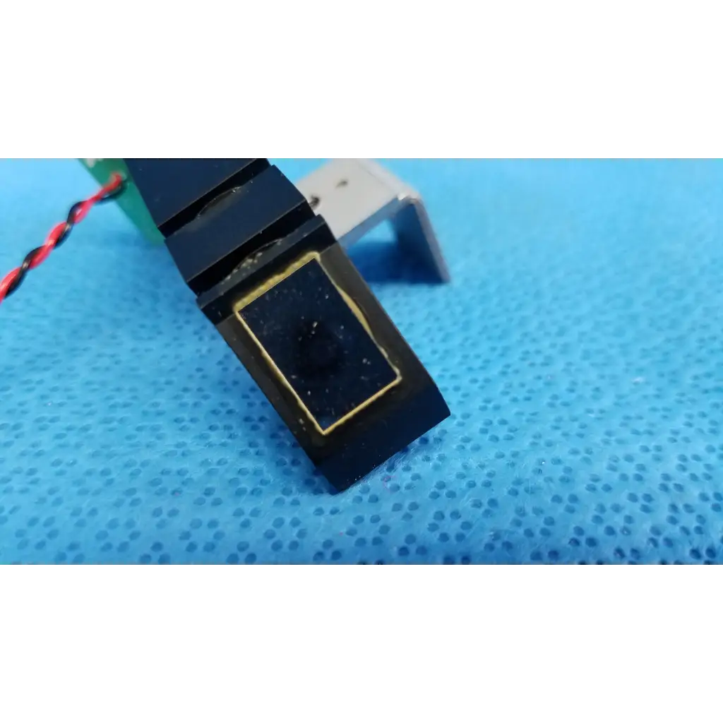 Black rectangular internal optical alignment prism lens module with gold-trimmed sensor and red-black wiring for topcon fundus camera
