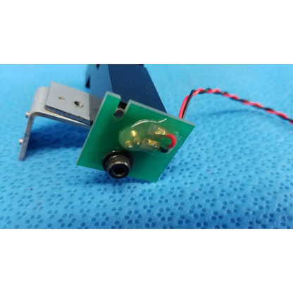 Green circuit board with black connector and red-black wire mounted on metal bracket for topcon optical alignment prism lens module