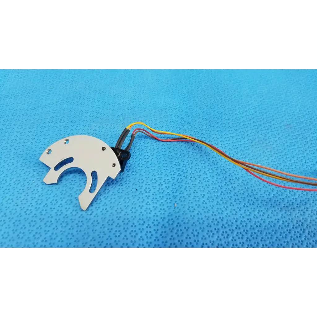 White plastic drone motor mount with multi-colored wiring attached to internal optical base axis limit sensor aluminum bracket