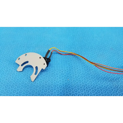 White plastic drone motor mount with multi-colored wiring attached to internal optical base axis limit sensor aluminum bracket