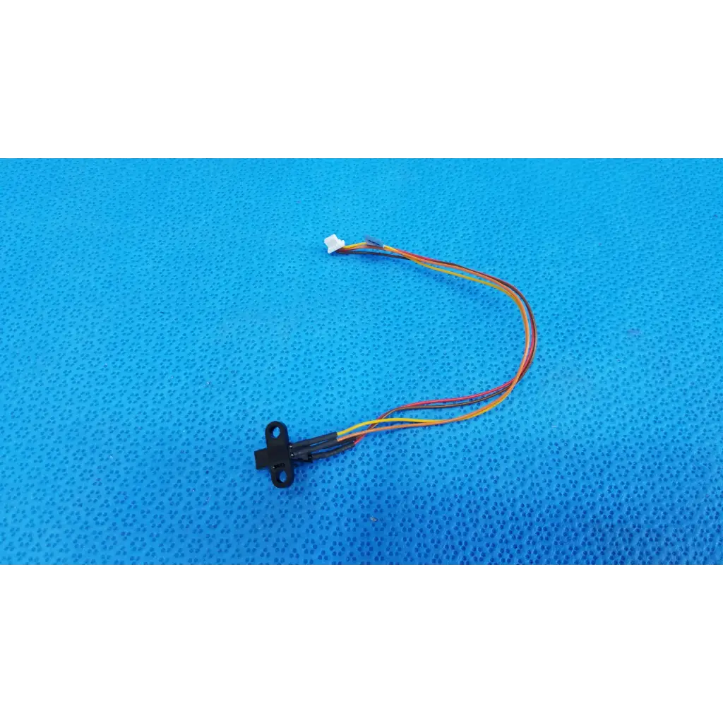Black plastic optical base photo-interrupter sensor wire harness with multi-colored wires and white connector for topcon