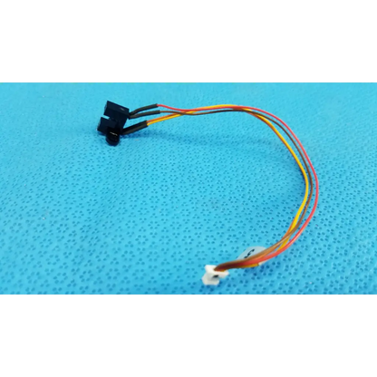 Black and white multi-colored sensor wire harness with small black plastic component for optical base photo-interrupter sensor
