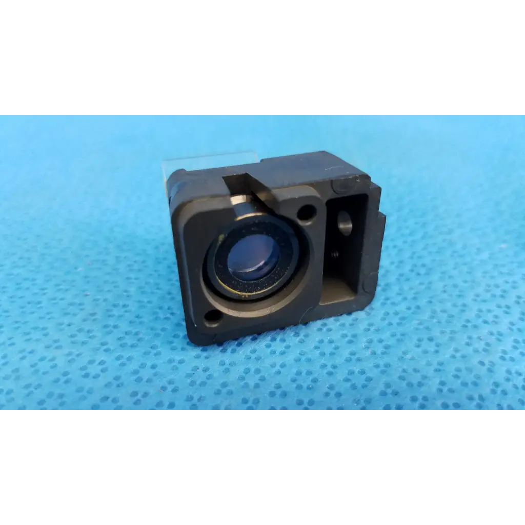 Black rectangular internal optical beam splitter lens block with circular lens and metallic accents for Topcon fundus camera