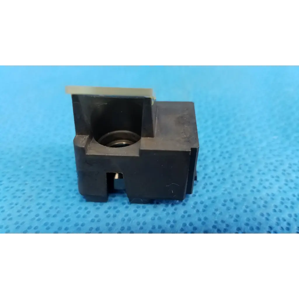 Black plastic electrical connector with metallic insert for internal optical beam splitter half mirror lens block use