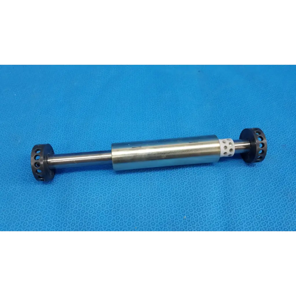 Silver metallic internal optical core piston cylinder with black perforated end caps and white mesh for topcon fundus camera