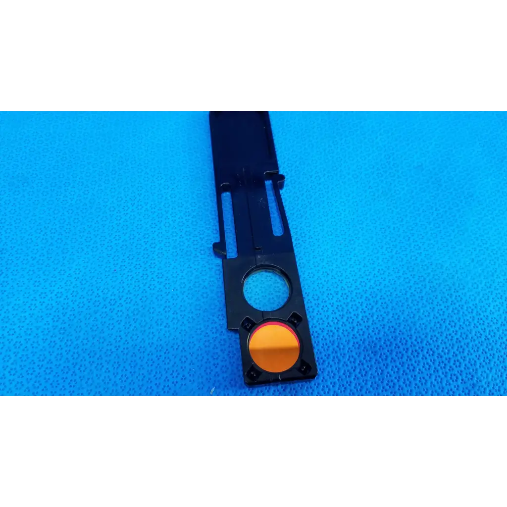 Black plastic camera lens mount with circular orange optical filter slider for fundus retinal camera topcon trc-nw8