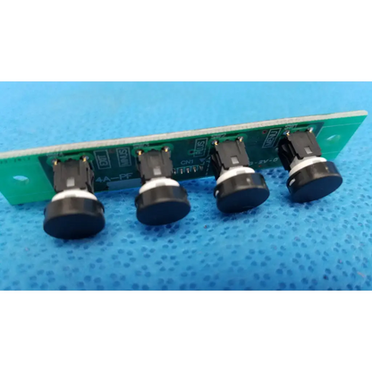 Green circuit board with four black control menu switch buttons on white bases for internal osd control menu pcb board