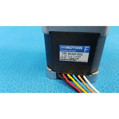Black and silver sanyo denki sanmotion f stepper motor with multicolored wiring for topcon trc-nw8 fundus camera