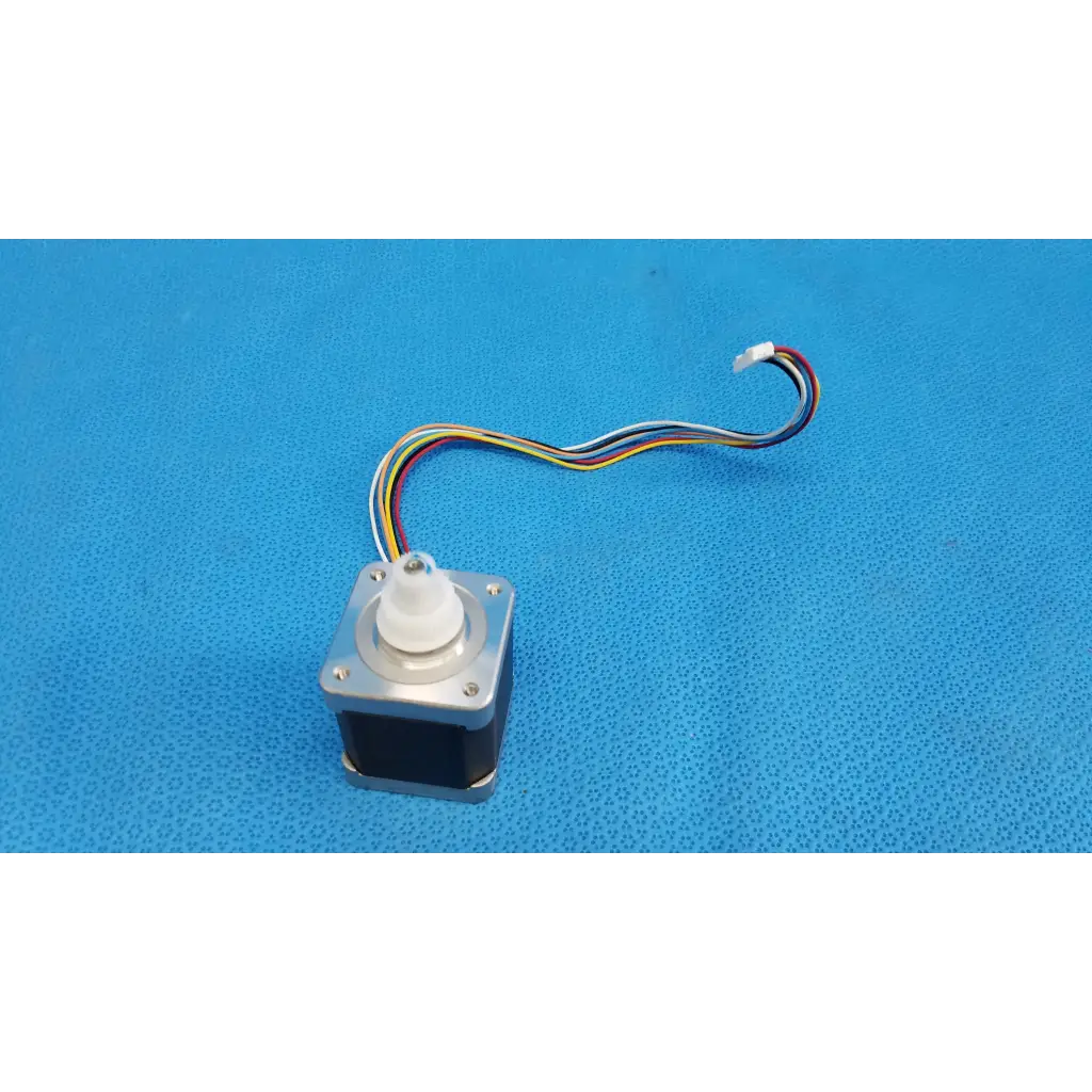 Silver metallic stepper motor with white plastic shaft and multicolored wiring for topcon trc-nw8 fundus camera